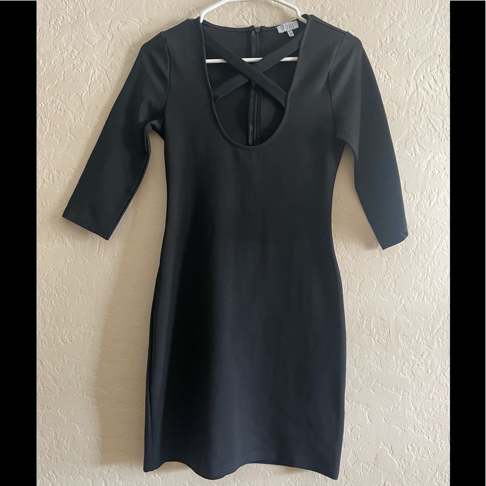 Fitted black cross front dress.